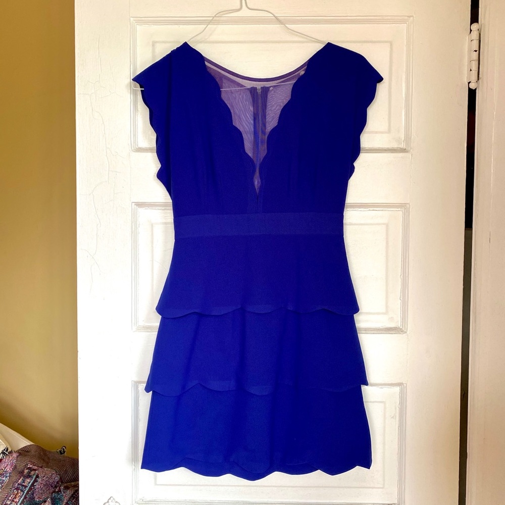 Flirty blue cocktail dress with mesh cutouts